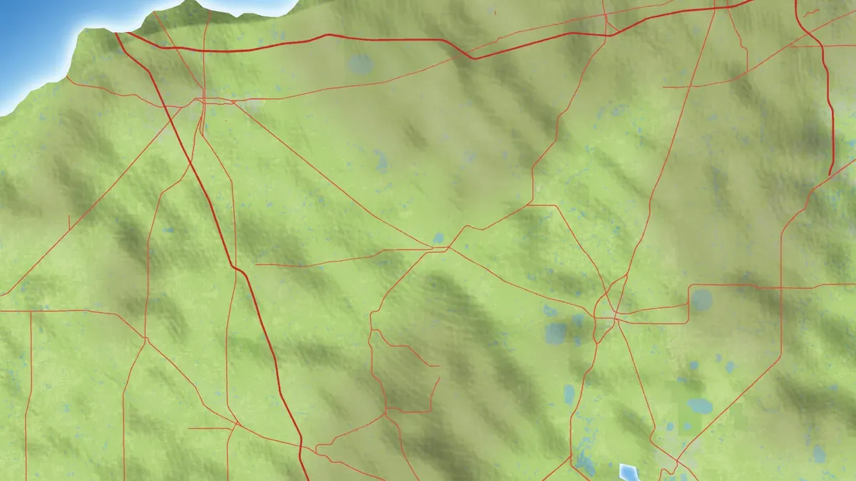 Atlas-style preview map: hilly, forested land with country roads in the north of the map, the coast at the top left